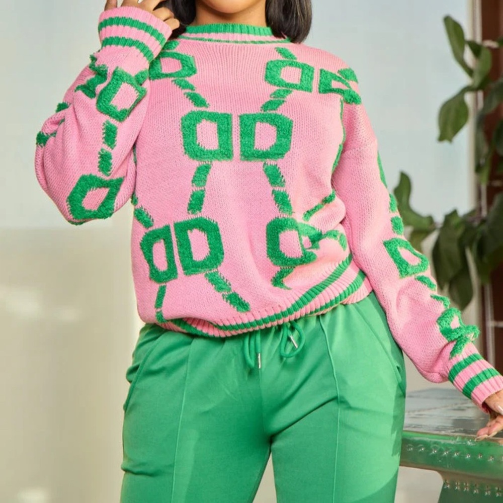 Pink and green sweater